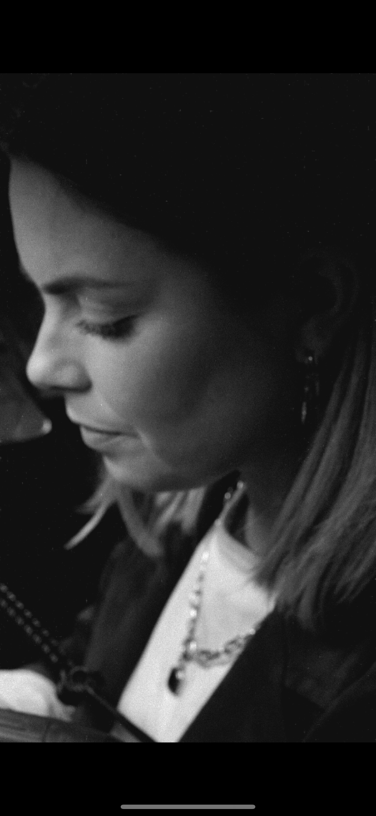 Liv Thurlwell inspecting jewellery